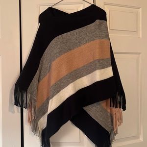 Poncho with tassels